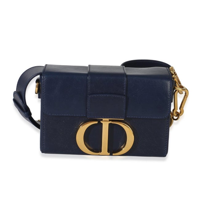 Item #: 154873 Features Interior: One slip pocket Dimensions: 6.75 x 4.5 x 2 in Handbag Closure Type: Push Lock Strap...