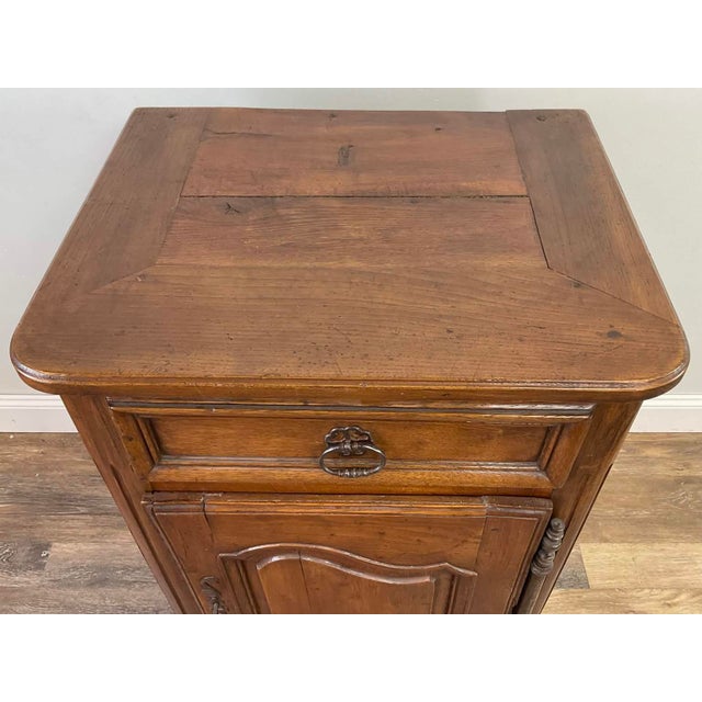 A beautifully proportioned late 19th-century French country cabinet crafted in oak and retaining a warm, naturally aged...