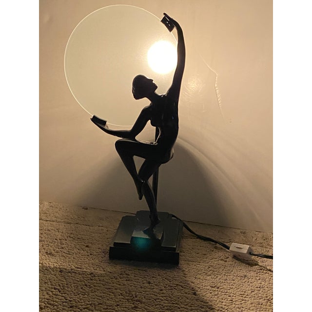 This Mann Art Deco Moon Lady Lamp (produced in the early 1980s) is a highly collectible, vintage Art Deco revival piece....