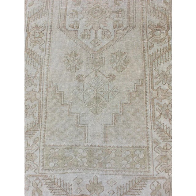 Textile Subdued Vintage Hand Knotted Turkish Oushak Runner With Medallions in Soft Cream For Sale - Image 7 of 12