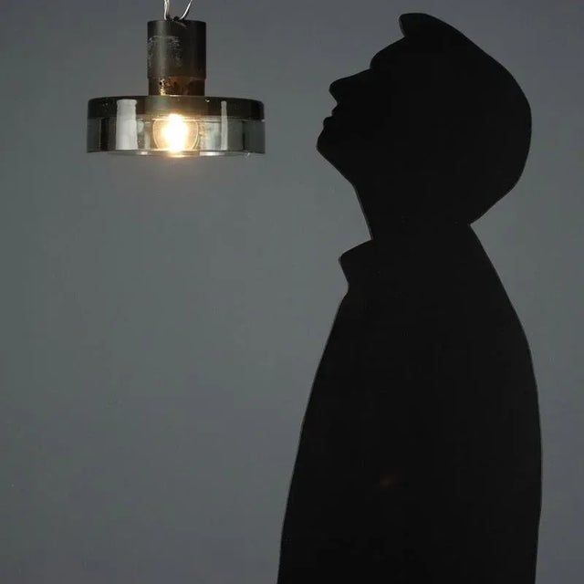 Ceiling lamp with enameled metal frame and thick glass diffuser. (One E27 bulb) This piece is attributed to the mentioned...