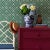 A sample of our Island House Forest Green Wallpaper Care Instructions: Wipe with damp cloth.