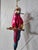 A vibrant and whimsical vintage mouth-blown glass Christmas ornament featuring a festive tropical scarlet macaw parrot....