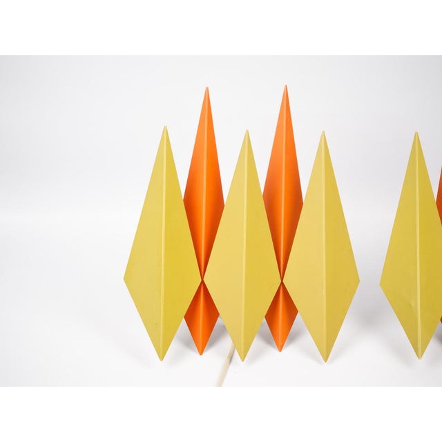 A pair of rare Diamant metal wall lamps by Svend Aage Holm Sorensen from the 1960s. Dimensions: Height: 35cm Depth: 11cm...