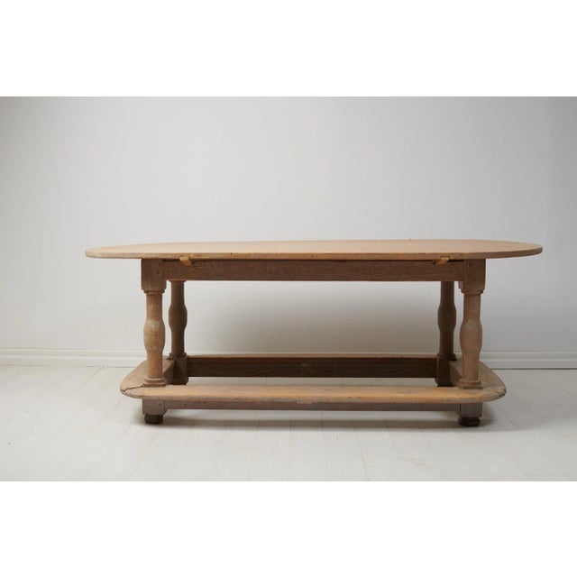 Rare genuine baroque table from Sweden dated 1758. The table is made by hand from solid pine. There is a very thin layer...