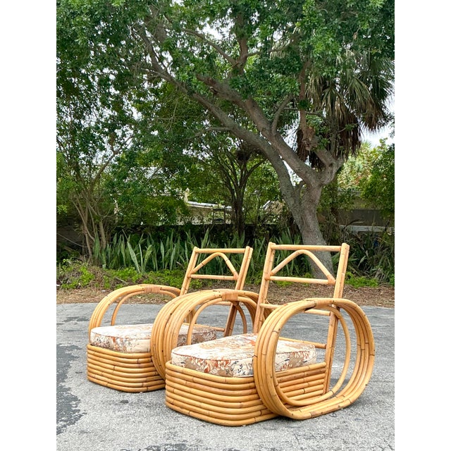 Transform your space with this exquisite pair of Vintage Coastal Bent Rattan Circle Lounge Chairs, a perfect blend of...