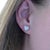 A breathtaking expression of romance and luxury, this elegant pair of heart-shaped stud earrings is crafted in solid 18k...