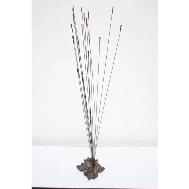 1960s Bowie Brutalist work composed of patinated steel rods and braze welded masonry nails with gilt decoration which fan...