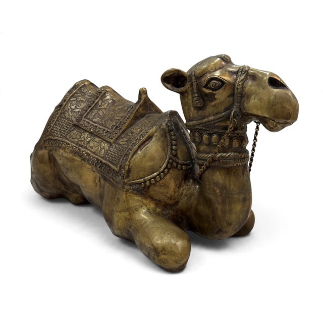 A large-scale ornate bronze camel sculpture. Features exquisite details in relief. Excellent condition.
