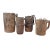 A group of beautifully carved wooden milk jugs. Vessels are covered with finely worked plaited band patterns and handles...