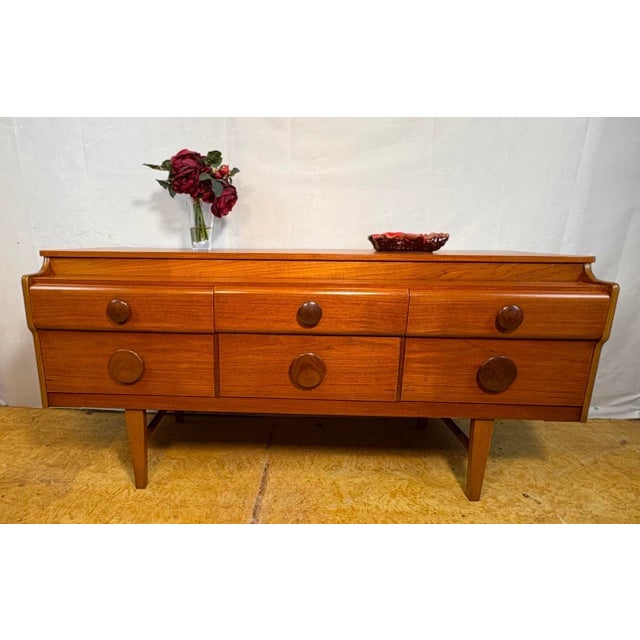 Mid-Century Modern Danish Teak Sideboard, 1960, in Restored conditions. Designed 1960 to 1969 This piece is attributed to...