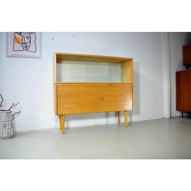 Brown Vintage Chest of Drawers with Glass Sliding Doors from VEB Deutsche Werkstätten Hellerau, 1970s For Sale - Image 8 of 8