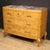 Elegant Italian chest of drawers from the mid-20th century. Furniture veneered in birch wood and adorned with original...