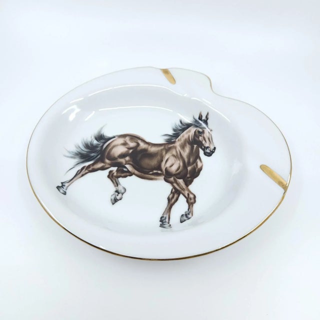 Vintage Porcelain Ashtray Horse Design. Gold rim. Excellent condition. Approximately 9x2in