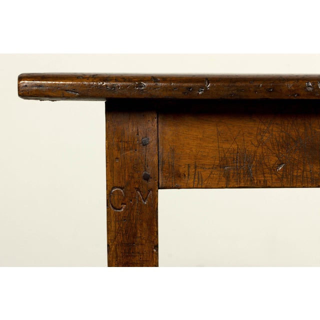 An early 19th-century French Provincial farmhouse refectory table of exceptional length, sourced in Provence, France....
