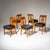 Set of six dining chairs in cherrywood with upholstered seats, raised on tapered square legs with straight aprons. The...