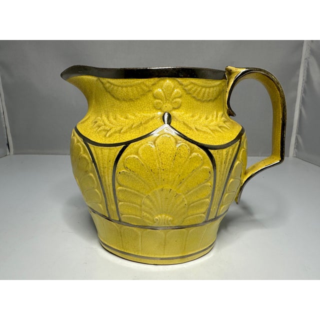 Rare & Original Antique Staffordshire Canary Yellow Silver Luster Jug for your consideration. The pitcher measures approx....