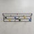 This coat rack is constructed from a frame of turned steel profile. The spheres are made of wood and have been repainted...
