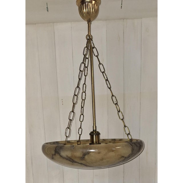 Art Deco Hanging Lamp with Heavily Grained Alabaster Bowl, 1930s, in Very Good conditions. Designed 1920 to 1949 Up to...