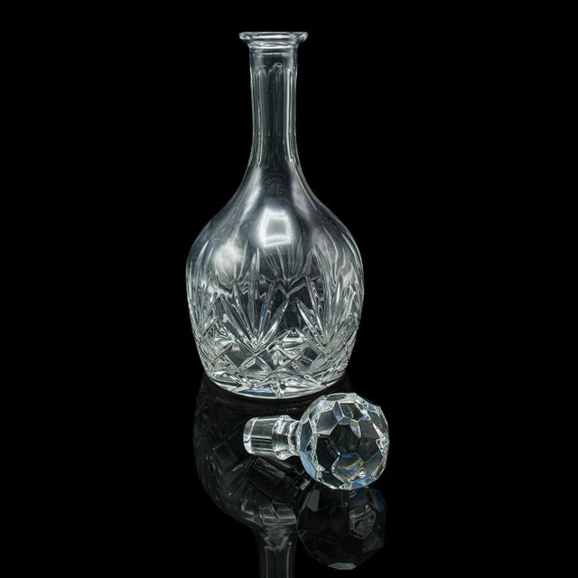 This is a vintage medium bodied wine decanter. An English, cut glass vessel ideal for serving Merlot or Grenache, dating...