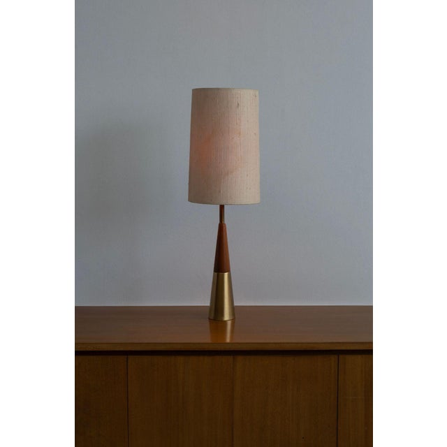 Tony Paul for Westwood Industries Table Lamp 1960c. Brass and Solid Walnut, circa 1960s A refined table lamp designed by...
