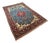 Hand-Knotted Blue Field Rug with Floral Medallion For Sale