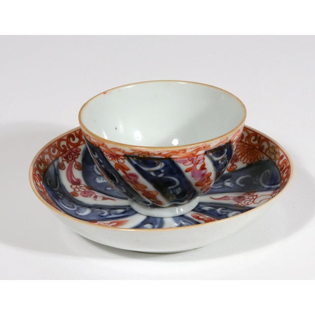 A Fine Chinese Export Porcelain Tea Bowl and Saucer Kangxi Period, Early 18th Century This finely potted Chinese export...