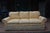 What a gorgeous couch! Overall in great condition. Sunshine did not cooperate very well, but it is more of the yellow/gold...