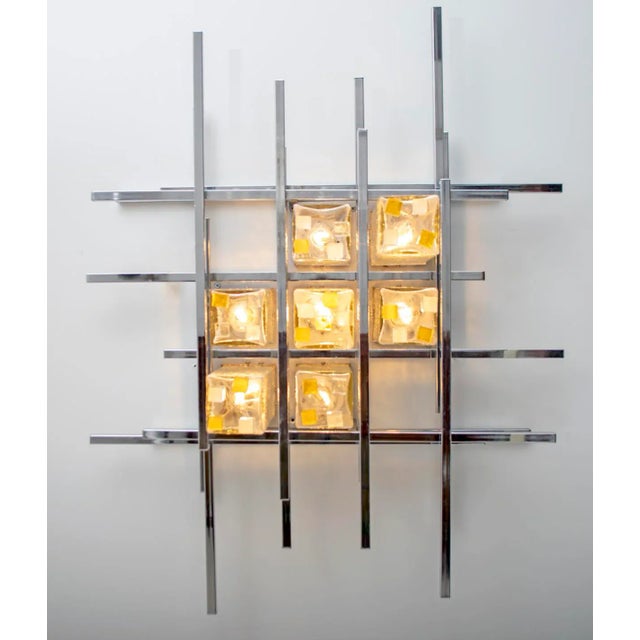 This wall lamp was created by maestro glassmaker Albano Poli for his company Poliarte. Applique with rectangular rods in...
