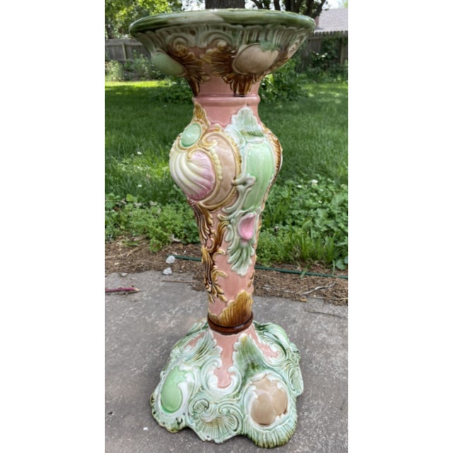 This exquisite antique pedestal is attributed to Royal Bonn and features a stunning aesthetic character that seamlessly...