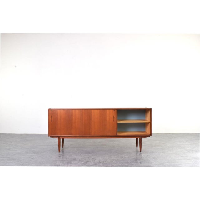 A Scandinavian sideboard from the 1960s, manufactured in Norway by P.S. Heggen Trevarefabrikk. This model is attributed to...