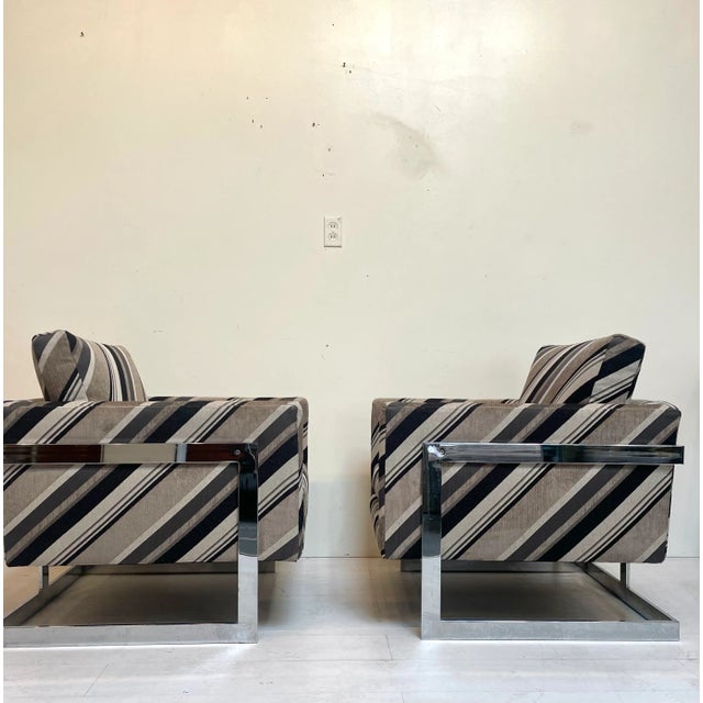 This pair of classic vintage Mid-Century model #989 club chairs were designed by Milo Baughman for Thayer Coggin. They...