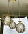 Hollywood Regency Trio (3) Mid-Century Hollywood Regency Pierced Brass Cluster Pendant Chandelier $4,500 For Sale - Image 3 of 18