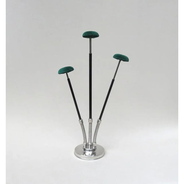 A rare 3-fold hutstand from the time of Art Deco, made of Gebr. Seifert, Lüdenscheid. The handling are made of ribbed...