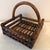 Vintage bamboo and wicker handled serving basket with a warm brown finish and decorative wrapped construction. A versatile...