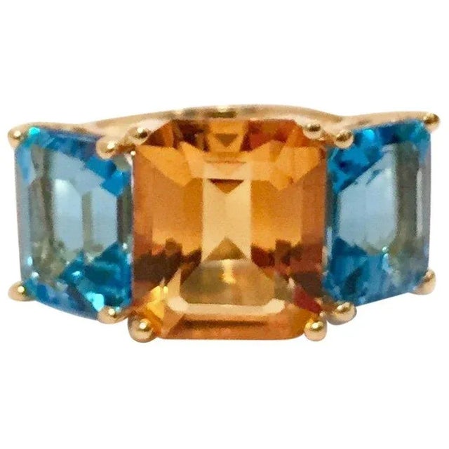 Christina Addison 18 Karat Yellow Gold Mini Emerald Cut Ring with Citrine and Blue Topaz. The Ring is sized for each...