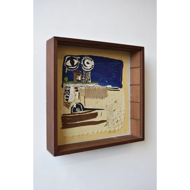 Vintage Mixed Media Abstract Collage Art in Shadowbox, Circa 1990s. Constructed from a repurposed teak display cabinet,...