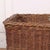 1920's Country house log basket with leather banding, rope handles and wheels underneath. 1920 This piece is designed in...