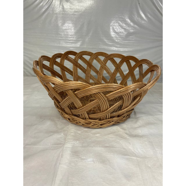 Extra large round woven rattan scalloped edge basket.