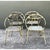 This vintage mid-century modern hoop-back folding chair set showcases a distinctly sculptural silhouette, with continuous,...
