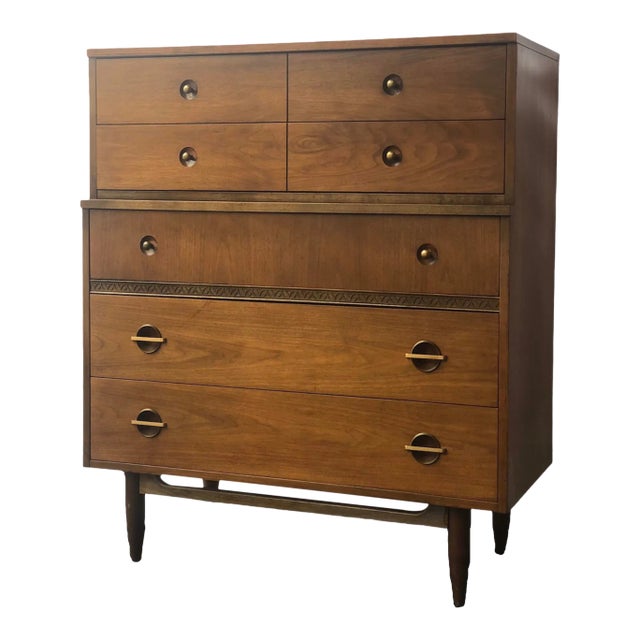 Vintage Mid Century Modern Highboy Walnut Toned Dresser With Elements of Traditional Woodworking With 5 Drawer Storage in the Style of Drexel For Sale