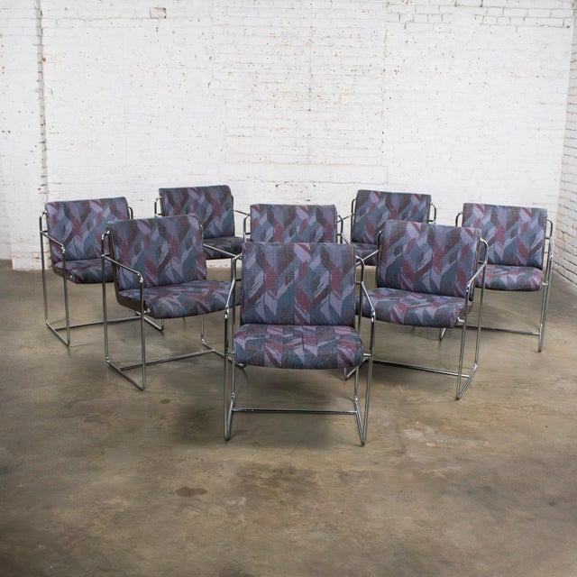 Wonderful vintage Modern Krueger set of 8 dining armchairs composed of chrome solid steel rod frames, black molded...