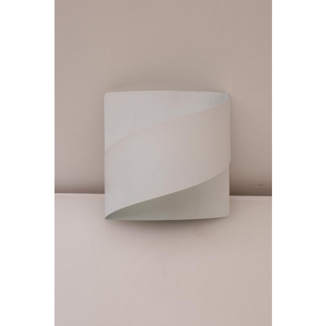 An elegant mid-century scandinavian wall lamp designed by peter celsing known as "band" for falkenbergs belysning, sweden,...