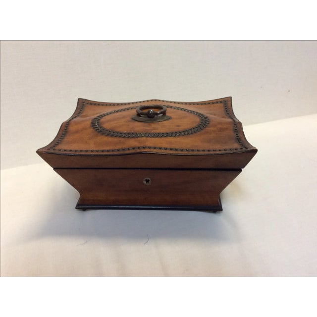 Beautiful little curved box with lots of applied detail tack work and unpolished original finial ring and escutcheon. The...