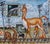In "Urban Zoo," a surreal tableau unfolds as a graceful giraffe and an elongated creature traverse a railway setting,...