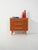 1950s-1960s chest of drawers with teak fronts, carved oak edges and handles, and flared legs. Compact, clean lines that...