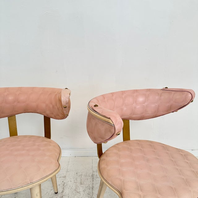 Very rare pair of armchairs from Umberto Mascagni from the 1950s. The chairs are made of wood and metal and covered in a...