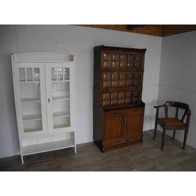 A very unusual small Art Nouveau office cabinet/bookcase/display case in solid oak. A patented modular cabinet, easily...