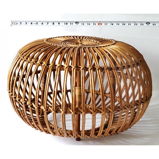 Offering an Franco Albini pencil reed rattan wicker ottoman/pouf, circa 1960s. This Italian Mid 20th Century Modern...