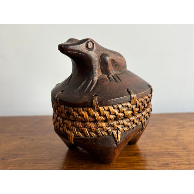 Small charming wicker and carved wood frog box with lid. Most items found at Pub & Oasis are vintage and antique in nature...
